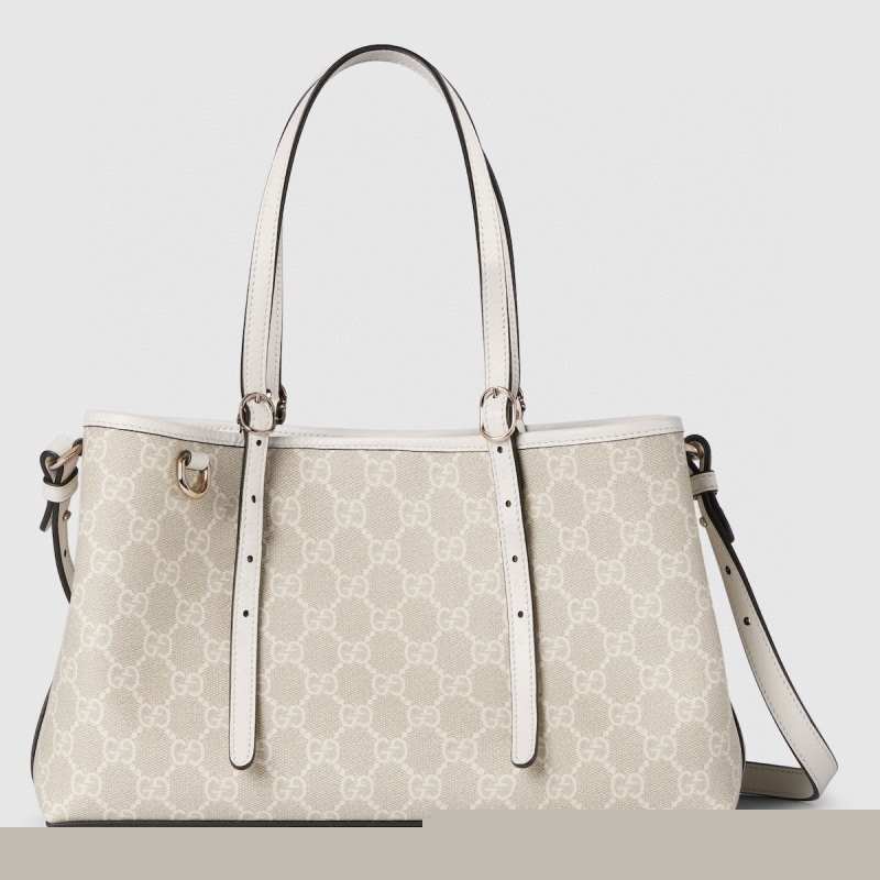G*u*i shopping bags